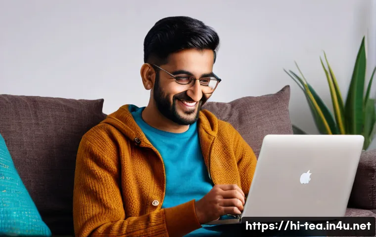 다과와 유튜브 콘텐츠 - A cozy indoor scene featuring a young Indian adult enjoying a YouTube comedy video on a laptop, sitt...