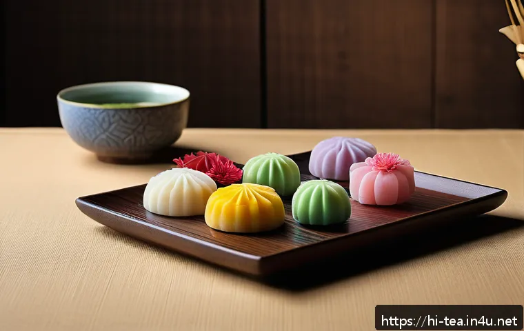 일본 와가시 문화 - A delicate assortment of traditional Wagashi sweets arranged on a minimalist Japanese ceramic plate,...